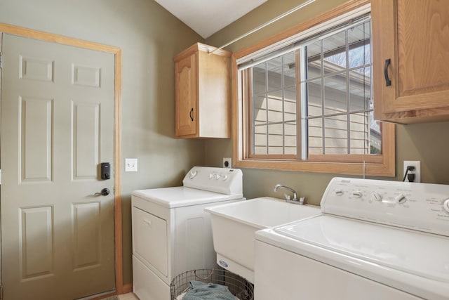 laundry room with washer and dryer and cabinet space