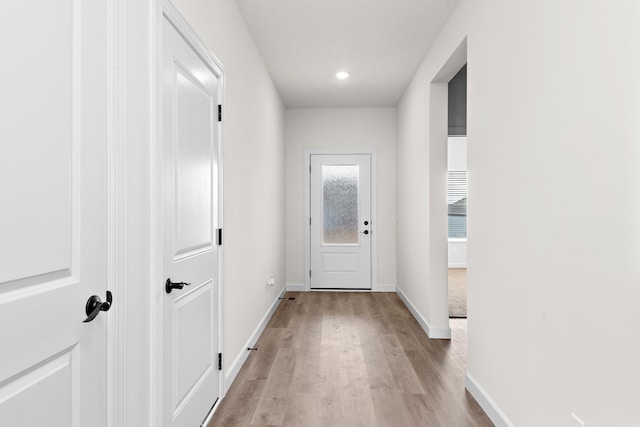 18788 Grant St NW, Elk River, MN 55330 - entryway with light wood-style flooring and recessed lighting