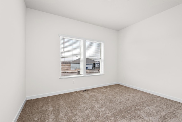 18788 Grant St NW, Elk River, MN 55330 - carpeted spare room featuring baseboards