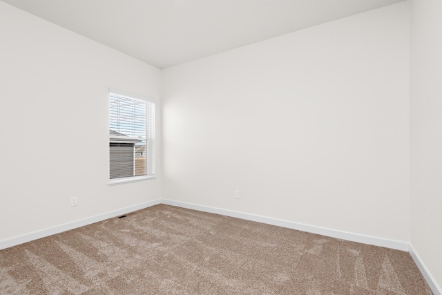 18788 Grant St NW, Elk River, MN 55330 - carpeted empty room with baseboards