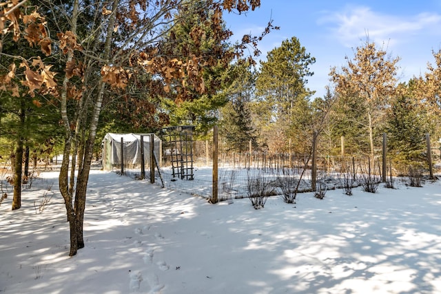 view of yard covered in snow