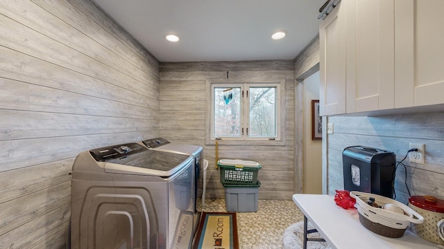 laundry area featuring washer and dryer, cabinet space, and recessed lighting