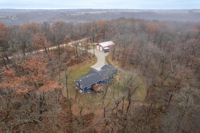 aerial view featuring a view of trees