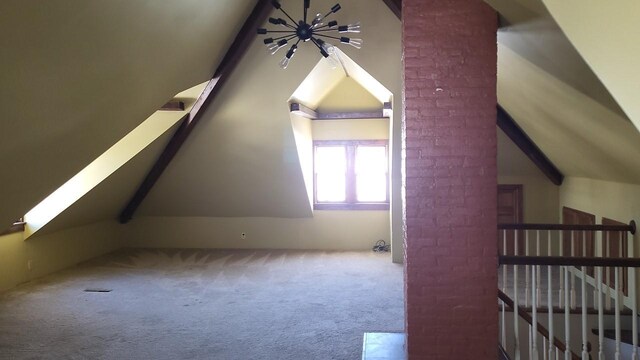 additional living space featuring vaulted ceiling and carpet flooring