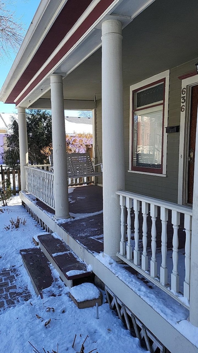 view of property exterior with a porch