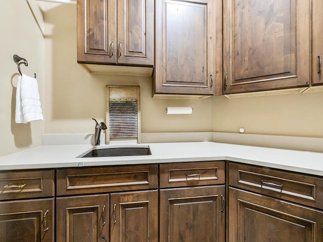 4350 Golfview Dr, Jordan, MN 55352 - kitchen with a sink, dark brown cabinets, and light countertops