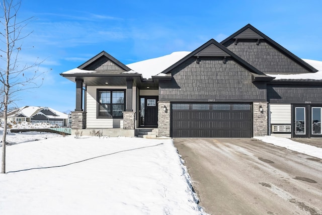 view of front of house with a garage and driveway