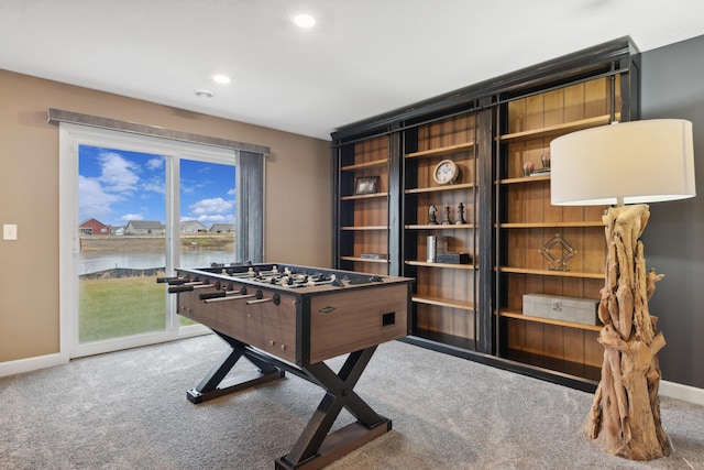 recreation room with recessed lighting, carpet flooring, and baseboards