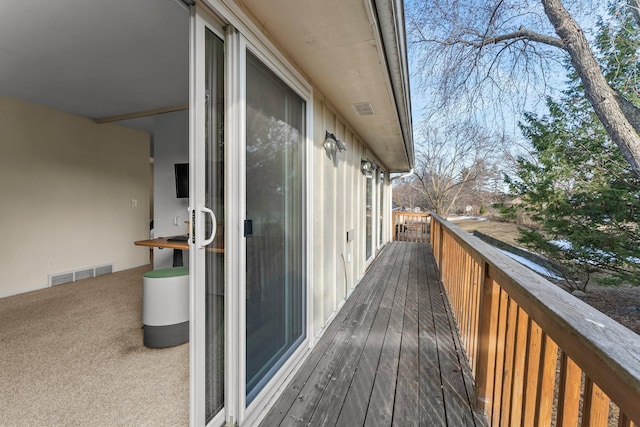 wooden terrace with visible vents