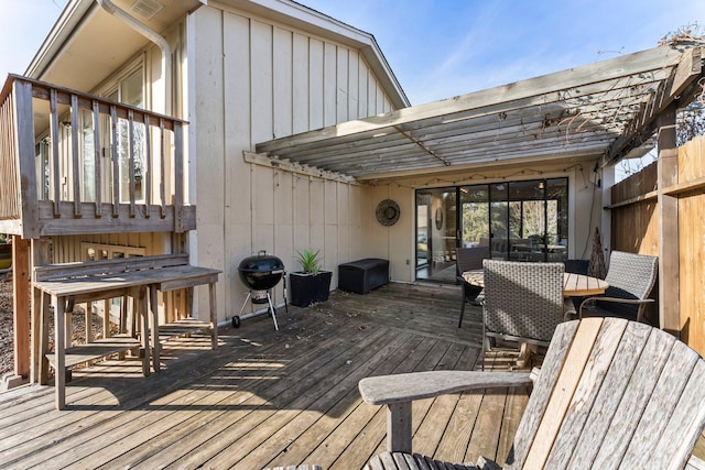 wooden deck with area for grilling