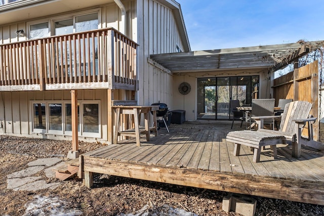 deck featuring a grill