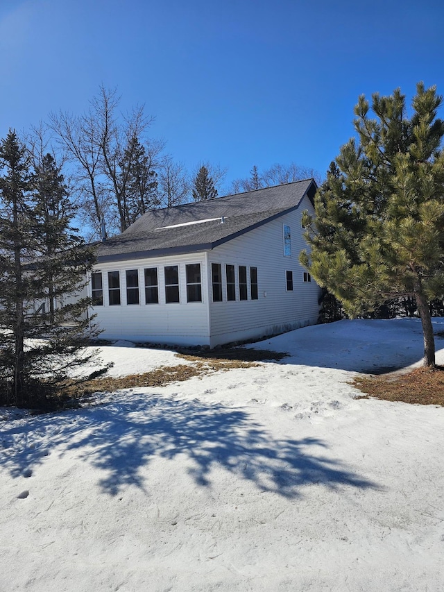 view of snow covered property