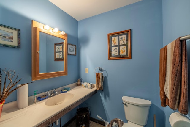 bathroom featuring a sink and toilet