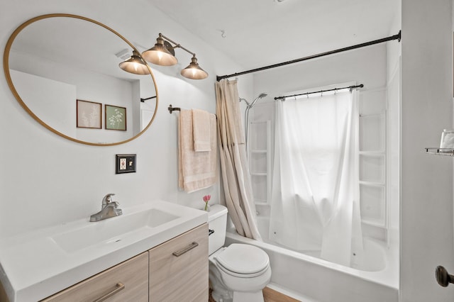 bathroom featuring toilet, shower / bath combo, and vanity