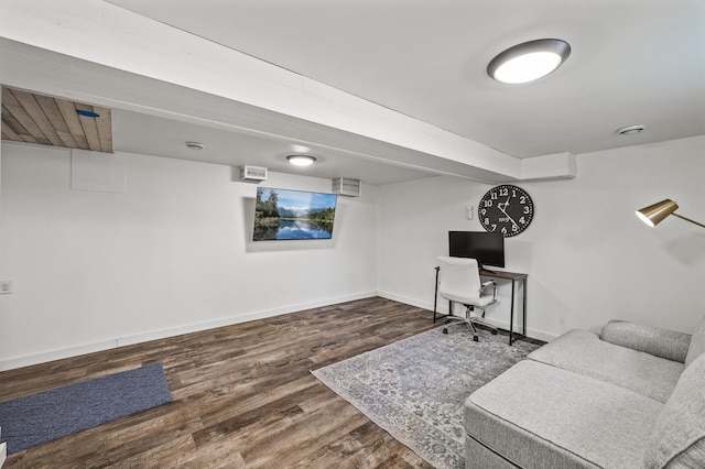 office area with baseboards and wood finished floors