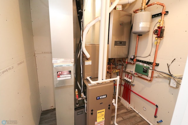 utility room with water heater