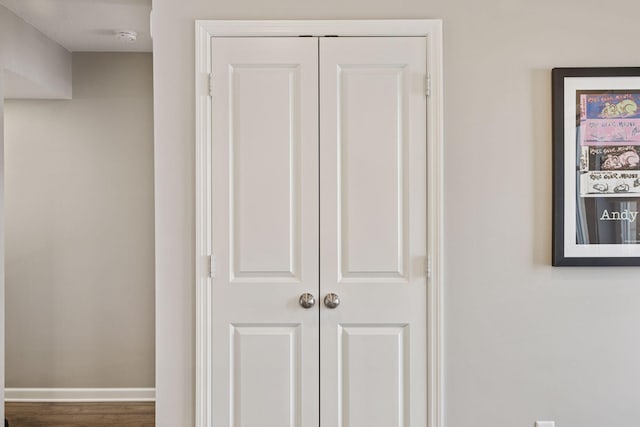 interior details with wood finished floors and baseboards