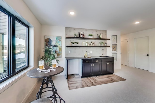 702 Summer Ave SE, New Prague, MN 56071 - bar featuring indoor wet bar, recessed lighting, and a sink