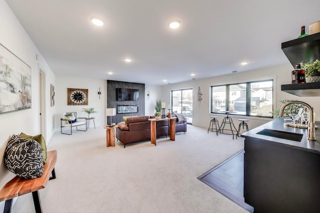 702 Summer Ave SE, New Prague, MN 56071 - living area with recessed lighting and carpet