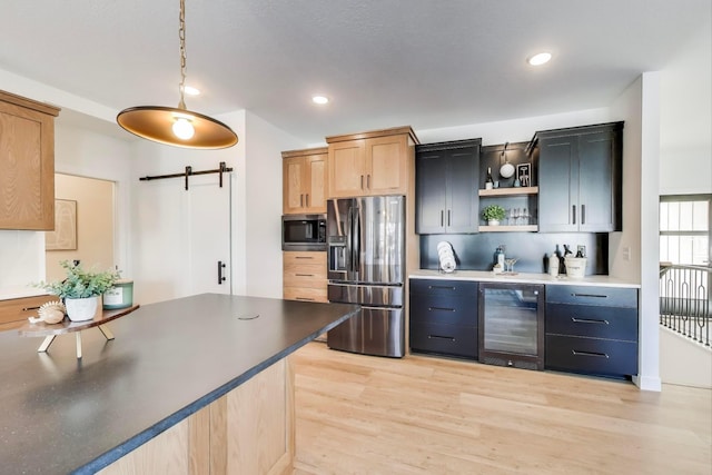 702 Summer Ave SE, New Prague, MN 56071 - kitchen with open shelves, a barn door, wine cooler, light wood-style floors, and appliances with stainless steel finishes