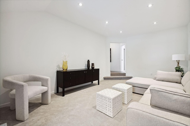 living area featuring vaulted ceiling, baseboards, carpet flooring, and recessed lighting