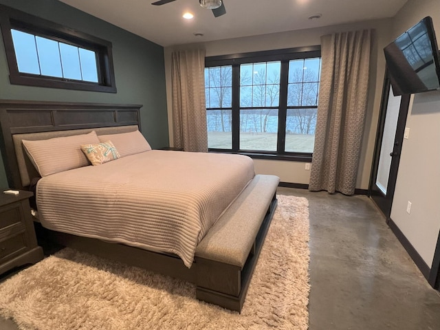 bedroom featuring finished concrete floors, recessed lighting, a ceiling fan, and baseboards