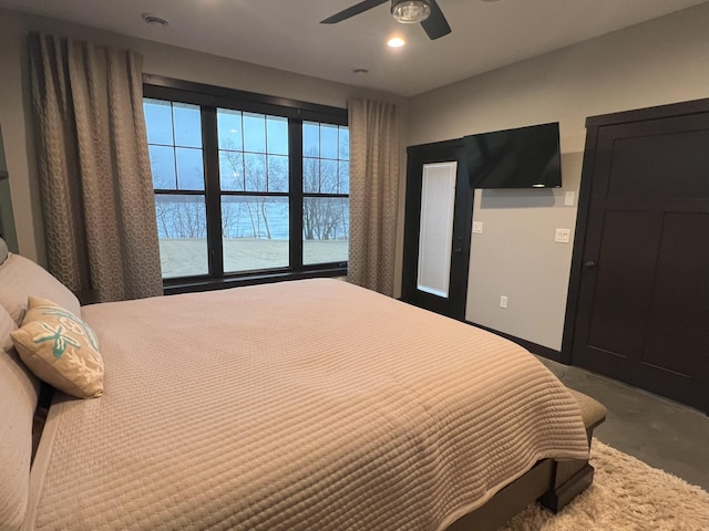 bedroom with recessed lighting, concrete floors, and ceiling fan