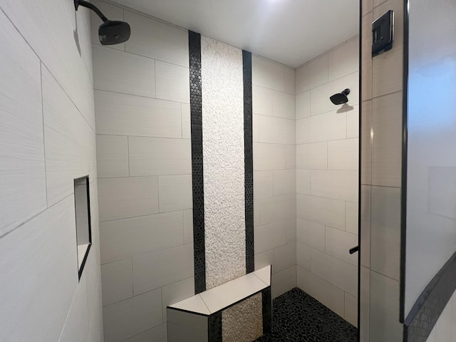 full bath featuring a shower stall