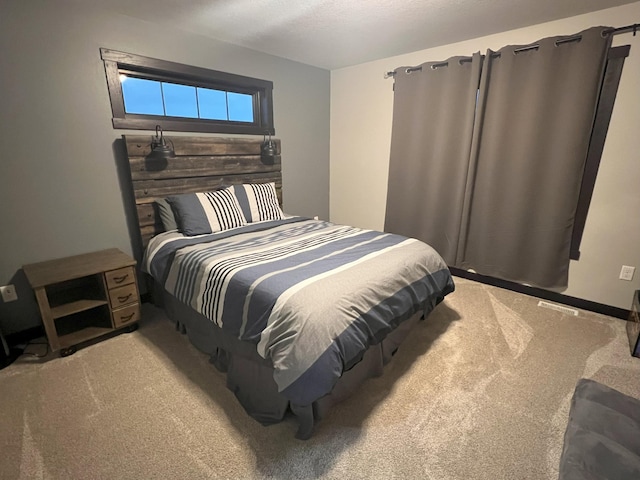 bedroom featuring carpet