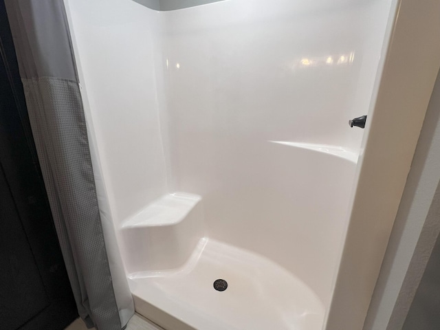 full bath with a stall shower