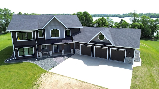 17087 Saylers Beach Rd, Lake Park Twp, MN 56554 - view of front of property with an attached garage, stone siding, a porch, concrete driveway, and roof with shingles