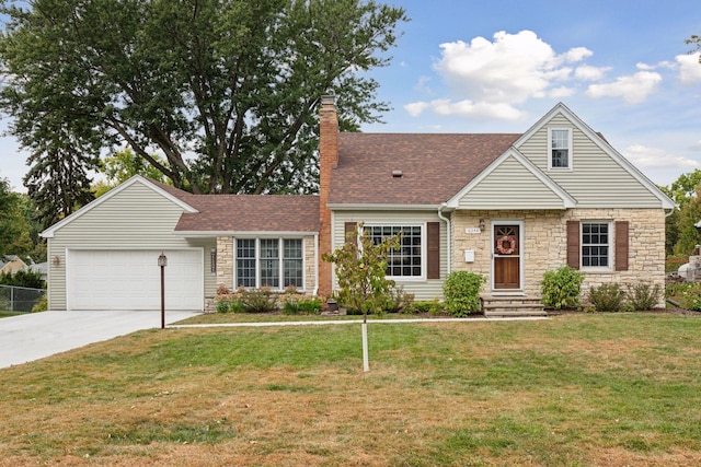 view of front of house with a front lawn, a garage, driveway, and a chimney