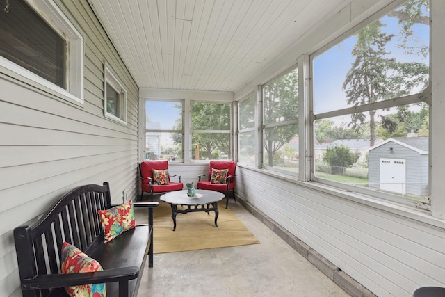 sunroom featuring wooden ceiling