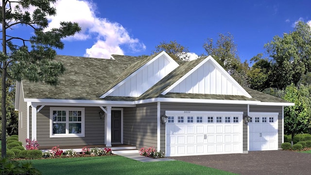 view of front of house with a garage, driveway, and board and batten siding