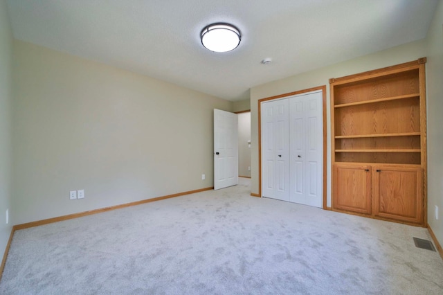 1505 Harrison Dr SW, Brainerd, MN 56401 - unfurnished bedroom with light carpet and baseboards