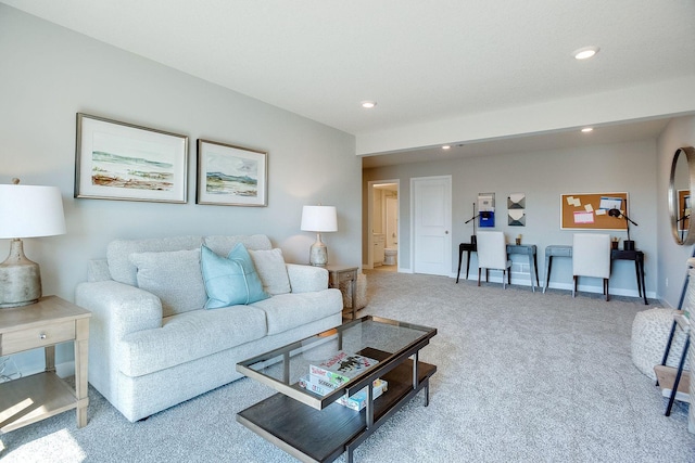 living room featuring baseboards, carpet flooring, and recessed lighting