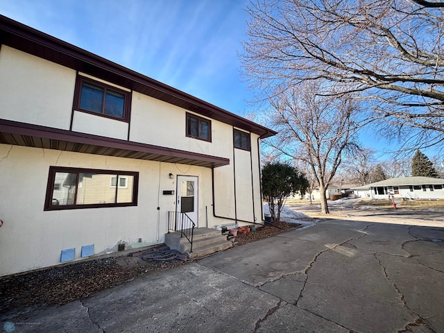 view of property featuring stucco siding