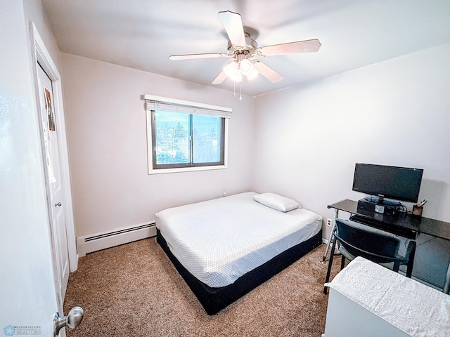 bedroom featuring a ceiling fan, a baseboard heating unit, and carpet flooring