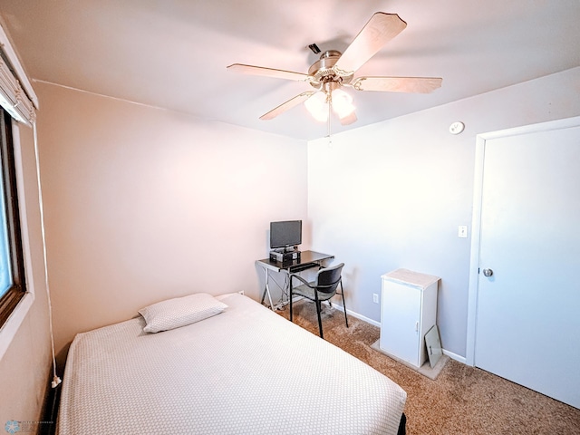 bedroom featuring carpet floors, ceiling fan, and baseboards