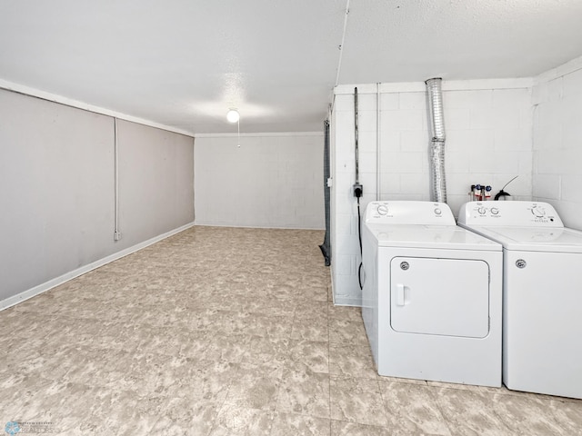 2815 9th St N Unit B4, Fargo, ND 58102 - laundry room with washer and clothes dryer and a textured ceiling