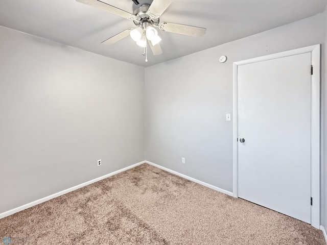 2815 9th St N Unit B4, Fargo, ND 58102 - unfurnished room featuring carpet, ceiling fan, and baseboards
