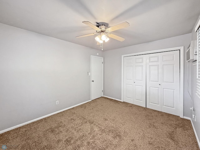 2815 9th St N Unit B4, Fargo, ND 58102 - unfurnished bedroom with carpet flooring, baseboards, and a closet