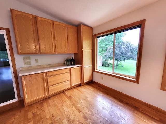 13857 Jacob Ave, Nininger Twp, MN 55033 - kitchen featuring light wood-style floors and light countertops