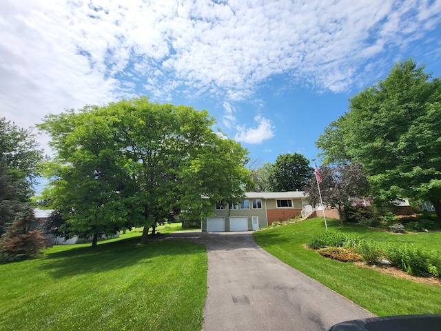 13857 Jacob Ave, Nininger Twp, MN 55033 - single story home featuring asphalt driveway and a front lawn