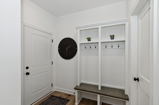 mudroom featuring wood finished floors and visible vents