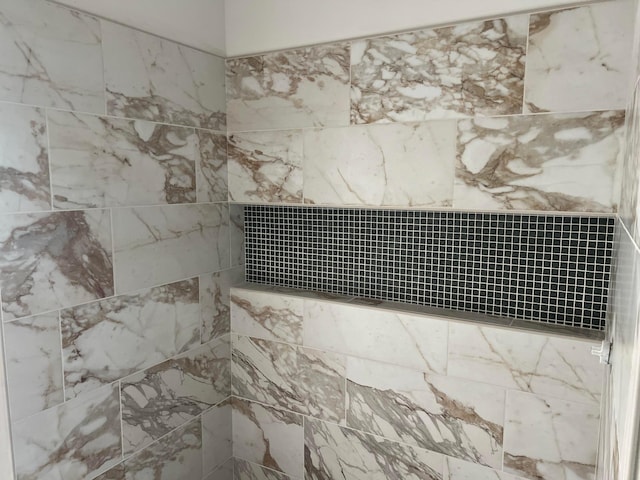 bathroom view of tiled shower