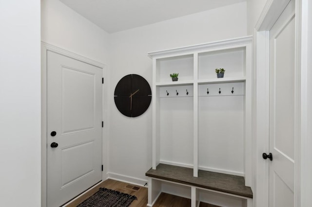 mudroom with wood finished floors