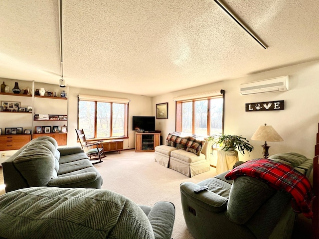 living room featuring carpet, a textured ceiling, and a wall mounted air conditioner