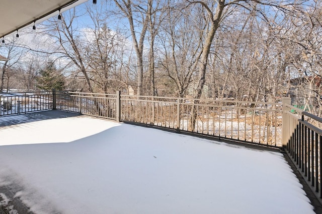 view of yard covered in snow