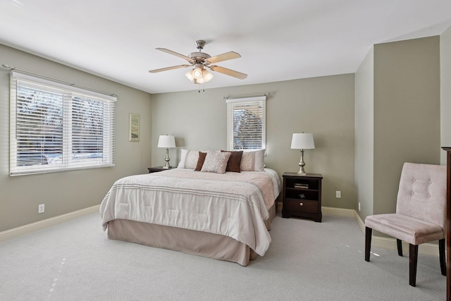 bedroom featuring a ceiling fan, baseboards, and carpet floors